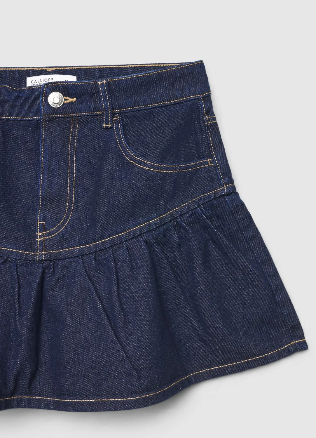 Calliope Jupe-short femme denim à volant taille haute