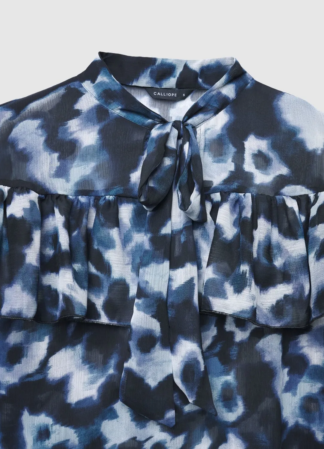 Calliope blouse à nœud et volants femme à motif