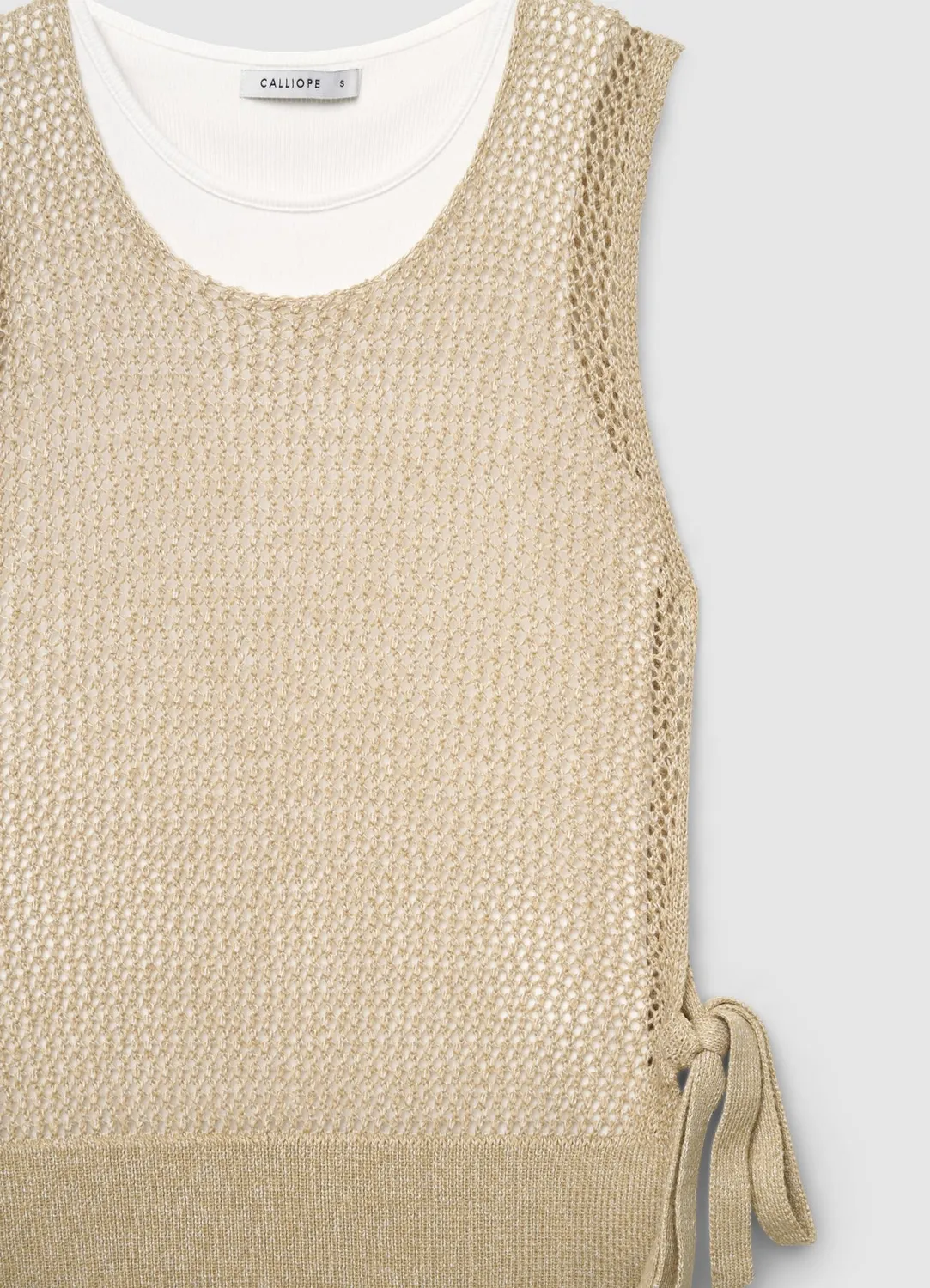 Calliope top maille uni sans manches à lacets