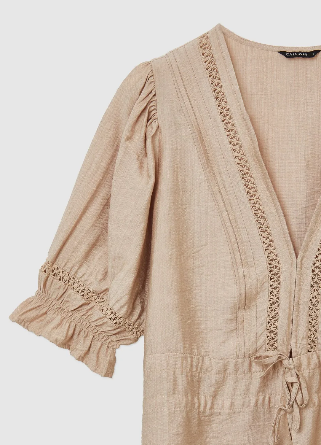 Calliope ricamo a jour blouse col V manches courtes